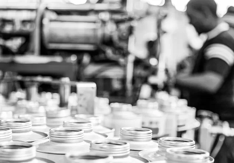 Workers in a glue factory, in Johannesburg, South Africa, in grayscale The workers in a glue factory, in Johannesburg, South Africa, in grayscale